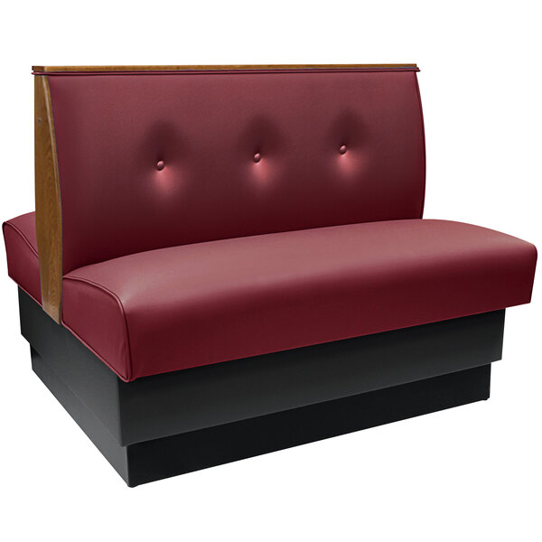 An American Tables & Seating red standard double booth with a tufted back.