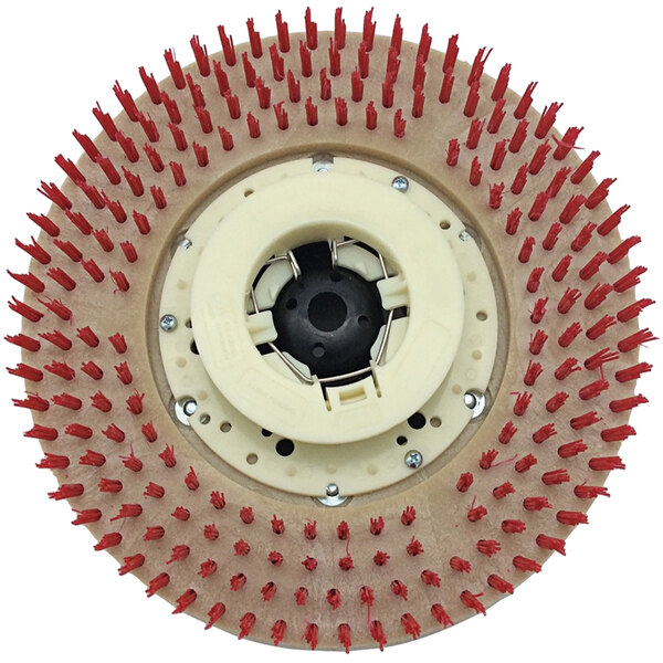 A circular object with red bristles.
