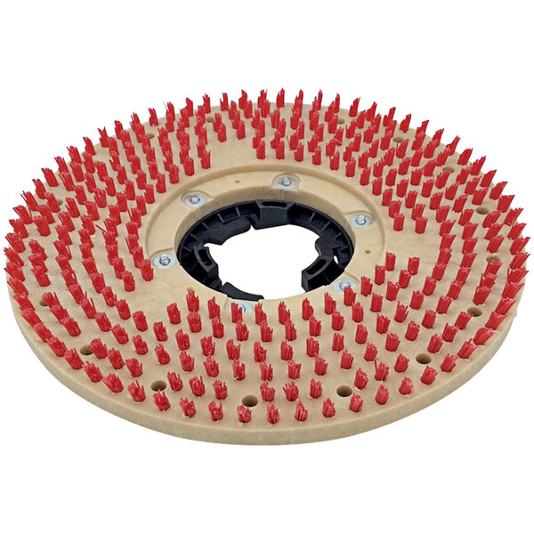 A circular pad driver with red bristles.