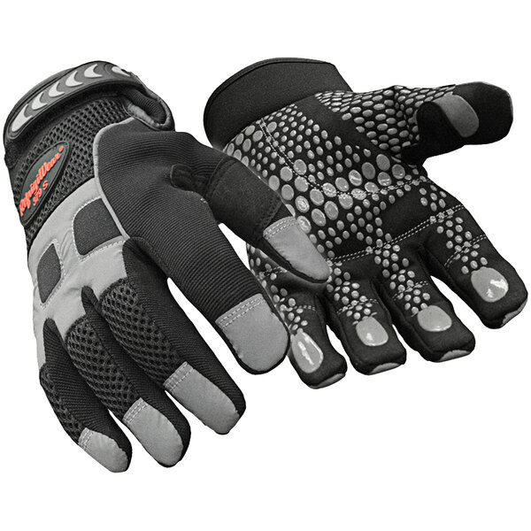 A pair of black RefrigiWear gloves with gray and white dots on the palm.