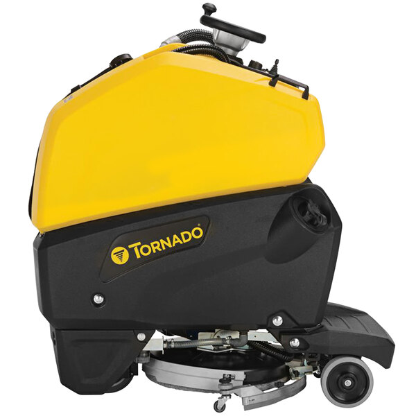 A yellow and black Tornado ride-on floor scrubber machine with wheels.