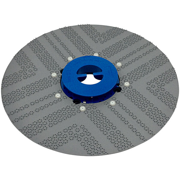 A circular Powr-Flite pad driver with a blue hole in it.