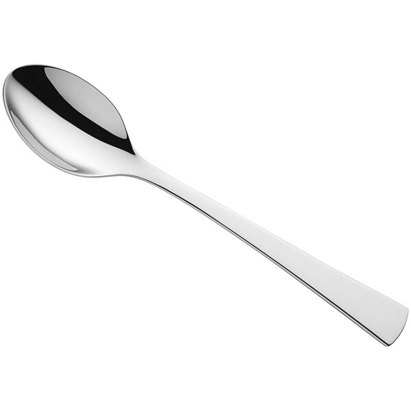 An Amefa Livia stainless steel serving spoon with a silver handle.