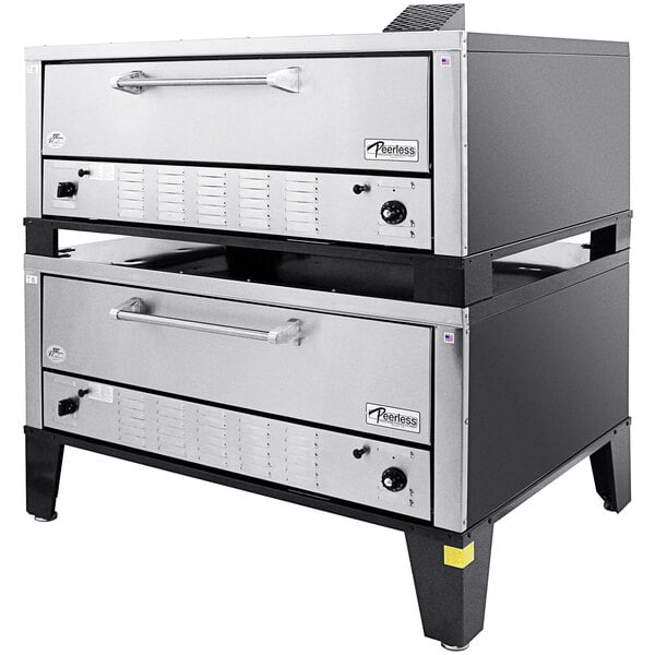 A Peerless natural gas super size double deck pizza oven with two large rectangular ovens.