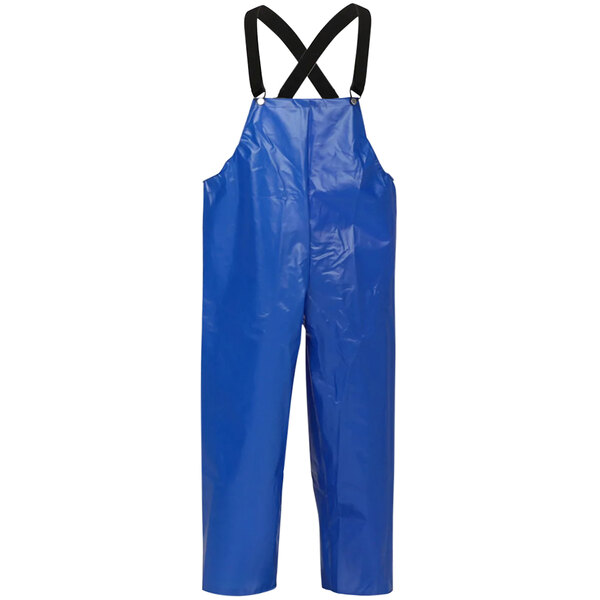 A close-up of a pair of blue Tingley Iron Eagle overalls with straps.