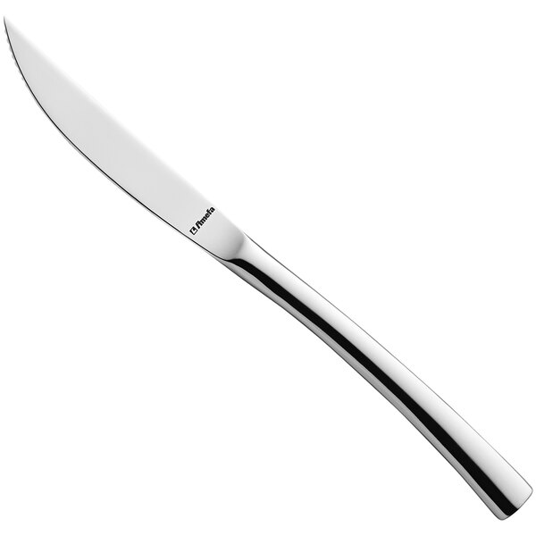 An Amefa Aurora stainless steel steak knife with a long handle.