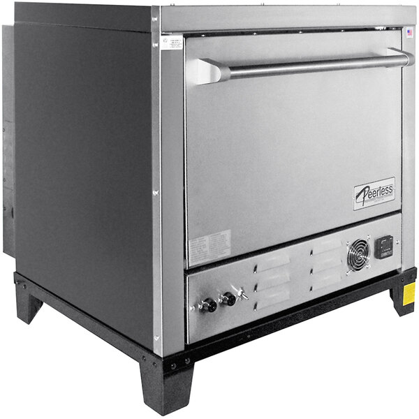 A large stainless steel Peerless countertop pizza oven with a metal door.