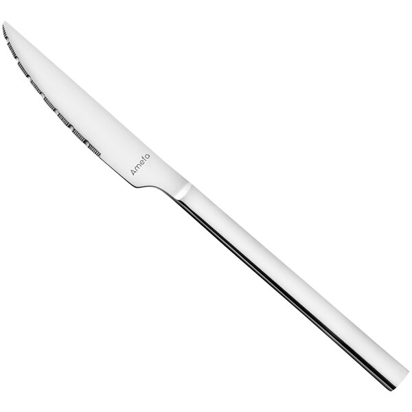 An Amefa Caractere stainless steel steak knife with a silver handle.