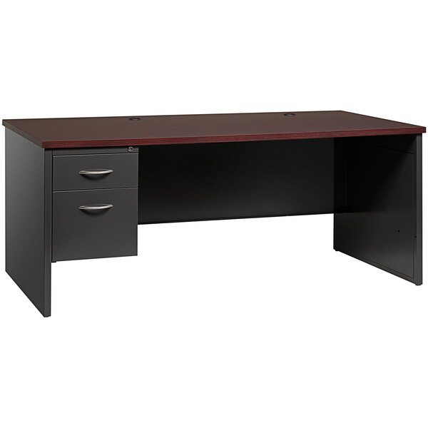 A charcoal and mahogany Hirsh Industries desk with a left-hand pedestal with drawers.