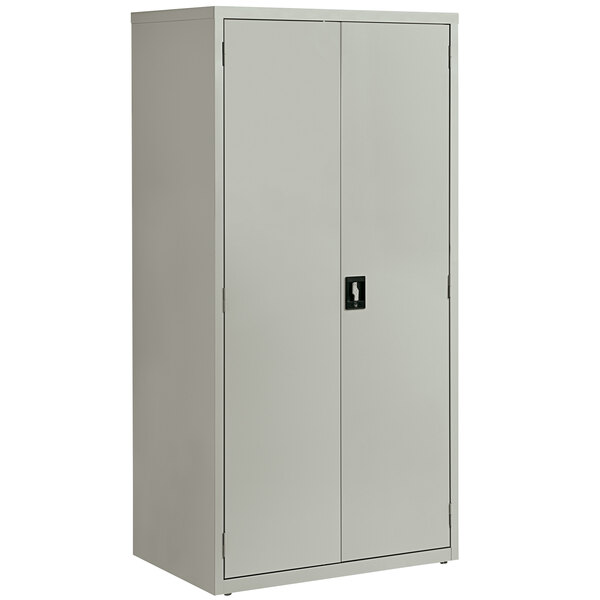 A light gray Hirsh Industries storage cabinet with two doors and four shelves.