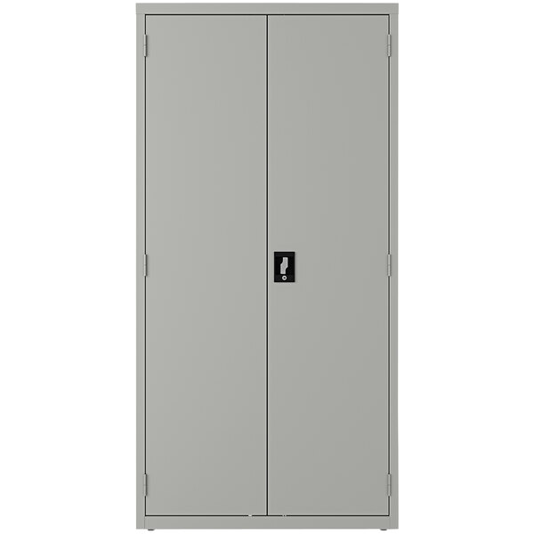 A light gray steel Hirsh Industries wardrobe cabinet with two doors.