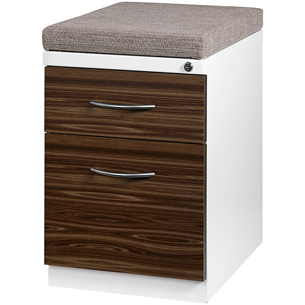 A white Hirsh Industries mobile pedestal filing cabinet with 2 walnut laminate drawers and a chinchilla seat cushion.