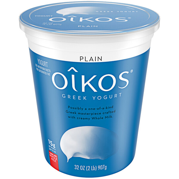 A blue and white container of Oikos plain whole milk Greek yogurt.