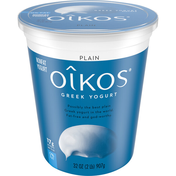 A white and blue container of Oikos Plain Nonfat Greek Yogurt.