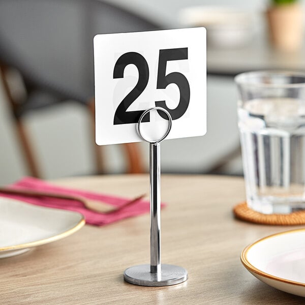 Choice 4" Plastic Table Number Cards 1 to 25 on a table.