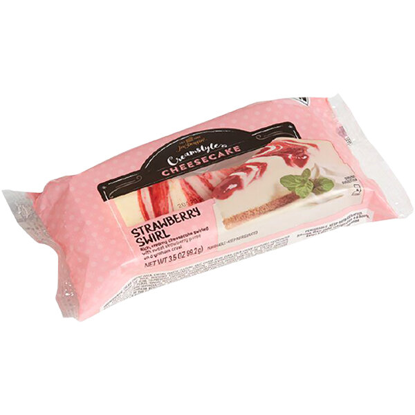 A package of Jon Donaire Strawberry Swirl Cheesecake on a white background.