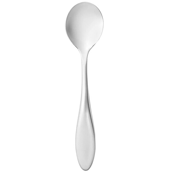 A Libbey stainless steel spoon with a white handle and a silver spoon.