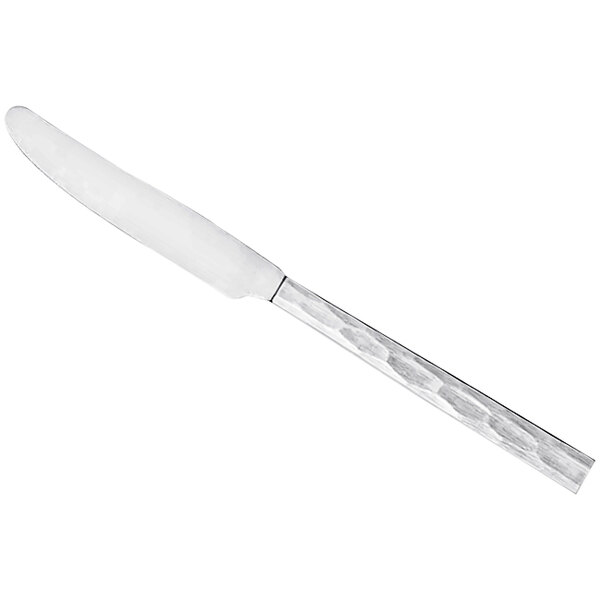 A Libbey silver dinner knife with a white handle.