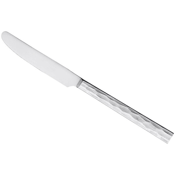 A Libbey Silver stainless steel dessert knife with a textured white handle.