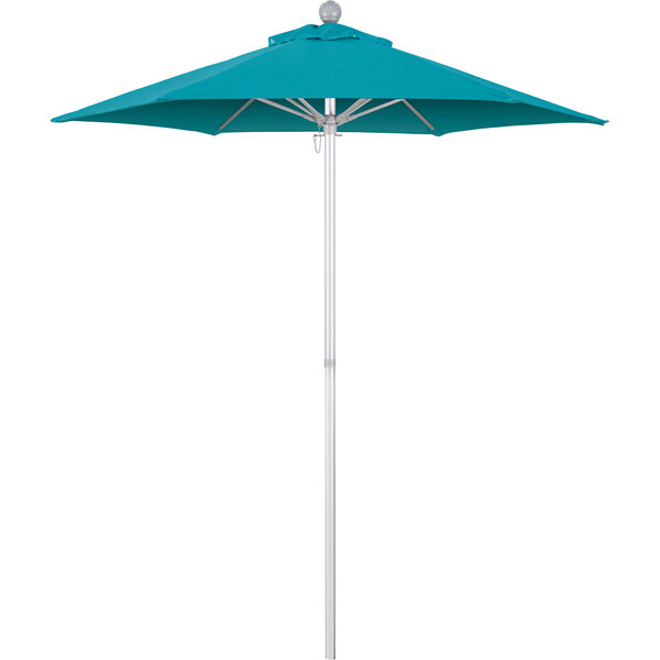 A close up of a blue California Umbrella with a white background.