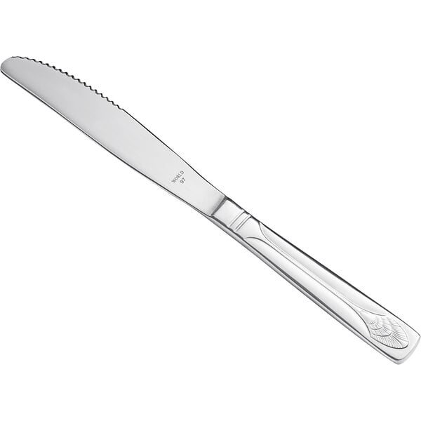 A Libbey stainless steel dinner knife with a fluted silver handle.
