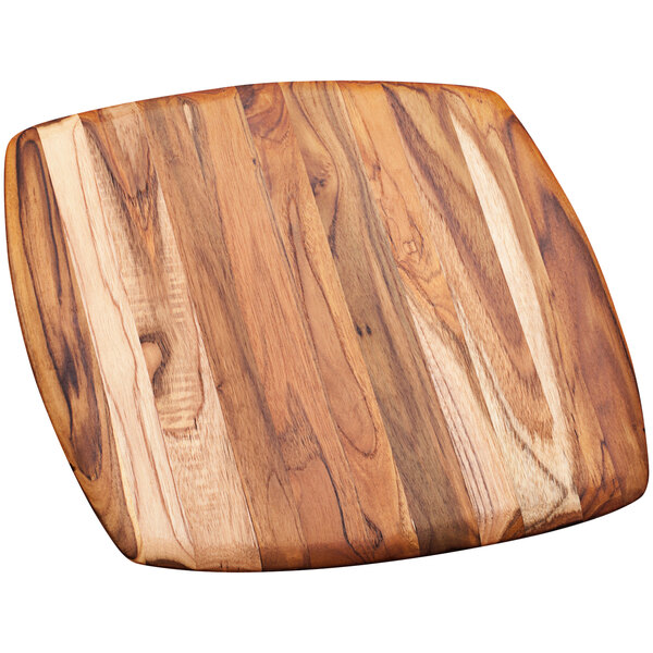 A Teakhaus teakwood serving board with a rounded edge on a white background.