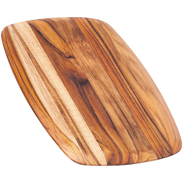 A Teakwood serving board with a rounded edge.