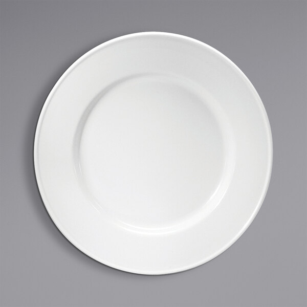 A close-up of a Oneida Classic cream white porcelain plate with a white rim.