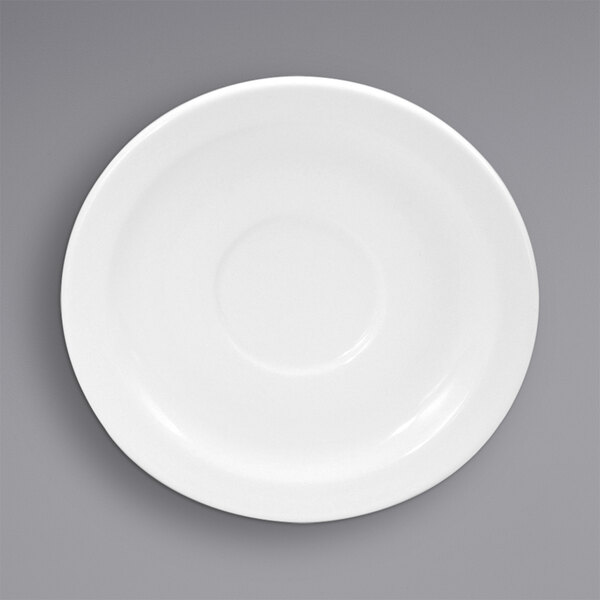 A Oneida cream white porcelain saucer with a white circle on a gray background.