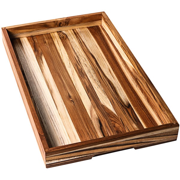 A Teakwood serving tray with hand grips.
