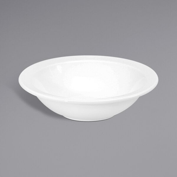 A Oneida Shape 2000 cream white porcelain grapefruit bowl on a white background.