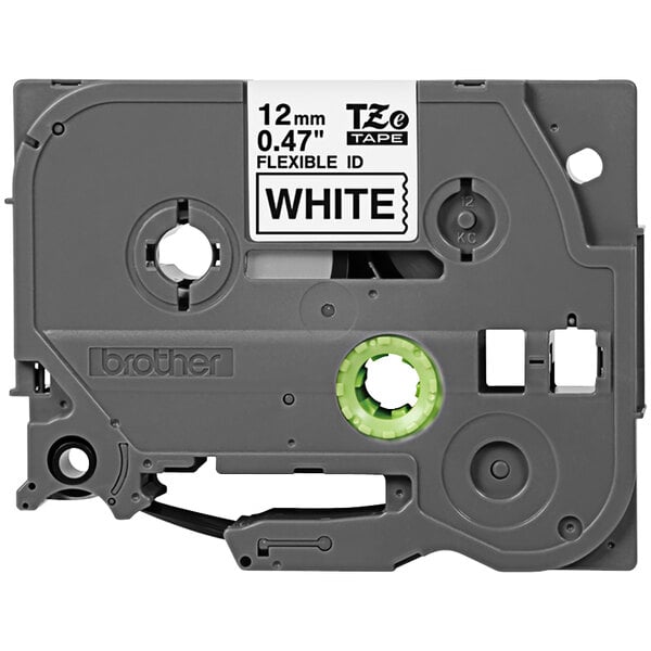 A close up of a Brother TZe231M label tape with white background and green and grey packaging.