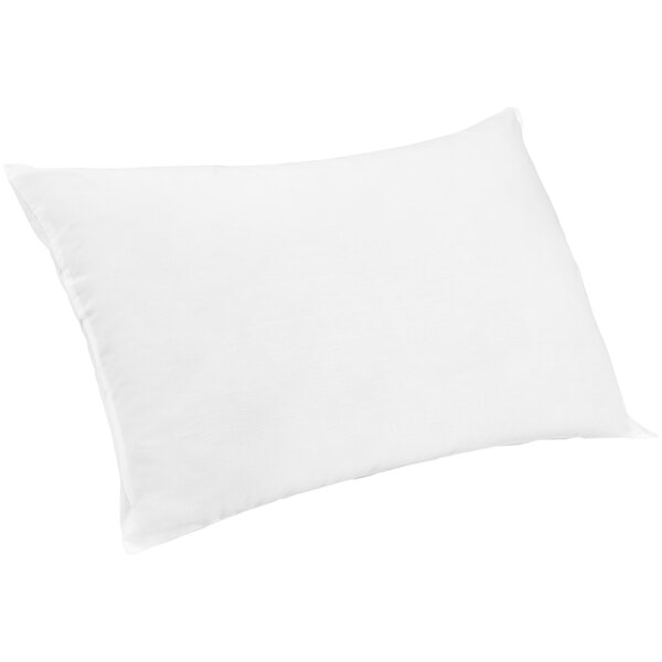 A Restful Nights white synthetic hotel pillow on a white background.