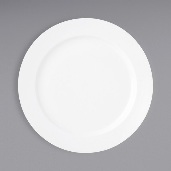 A Oneida Verge warm white porcelain plate with a white rim on a gray surface.
