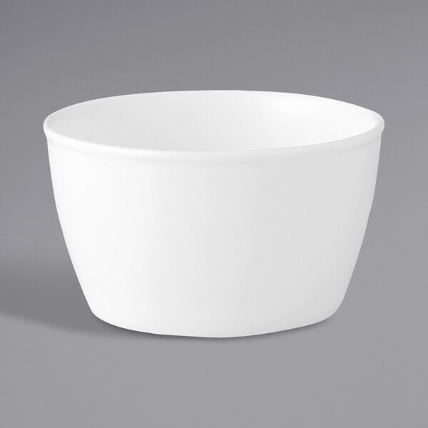 A white Oneida Verge porcelain sugar bowl on a gray surface.