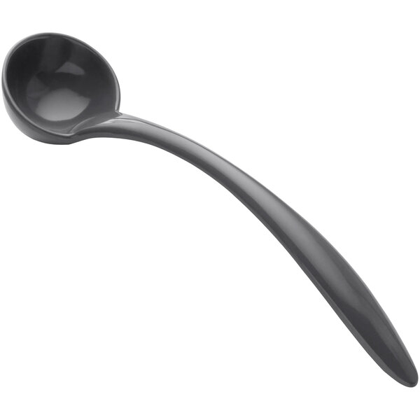 A gunmetal gray plastic spoon with a long handle.