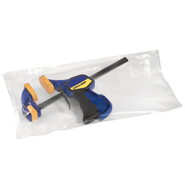 A Lavex clear plastic bag holding a blue and yellow tool.