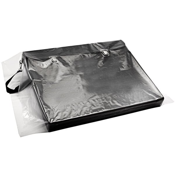 A clear flat poly bag with metal clasps.