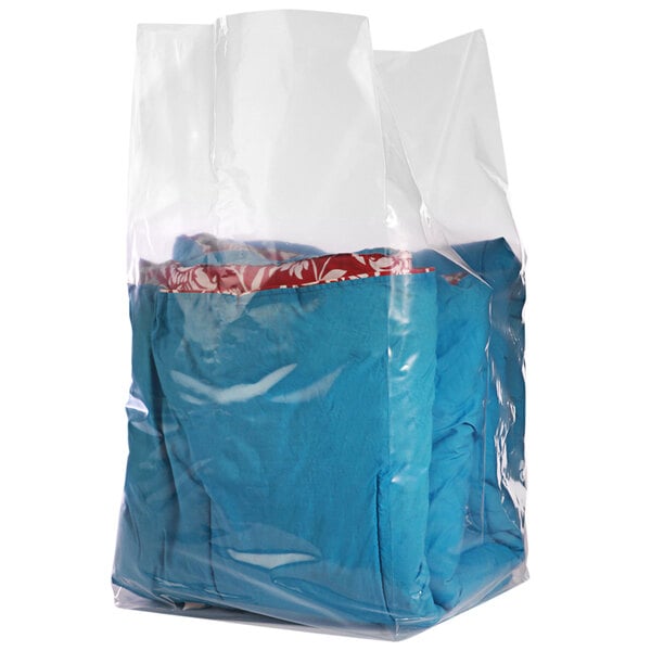 A clear plastic Lavex gusseted poly bag with blue and red clothing inside.
