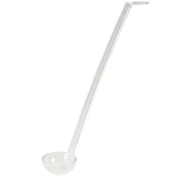 A clear plastic ladle with a long handle.