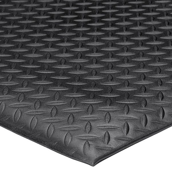 A black Lavex rubber mat with a diamond pattern.