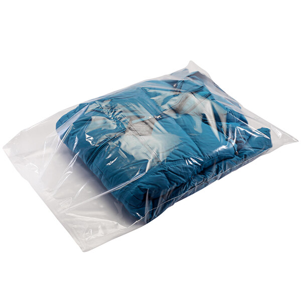 A Lavex clear plastic bag holding blue clothes.