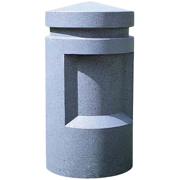 A close-up of a Wausau Tile concrete bollard with a triangular top.