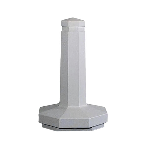 A white concrete bollard with a black reveal line on top.