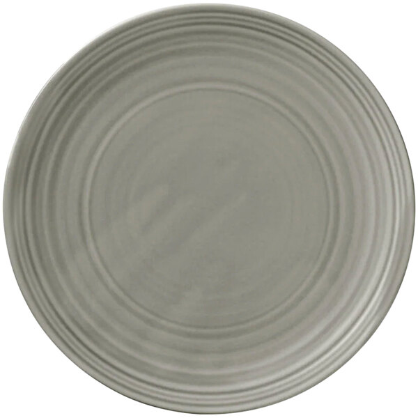 A white porcelain flat coupe plate with a circular gray pattern around the edge.