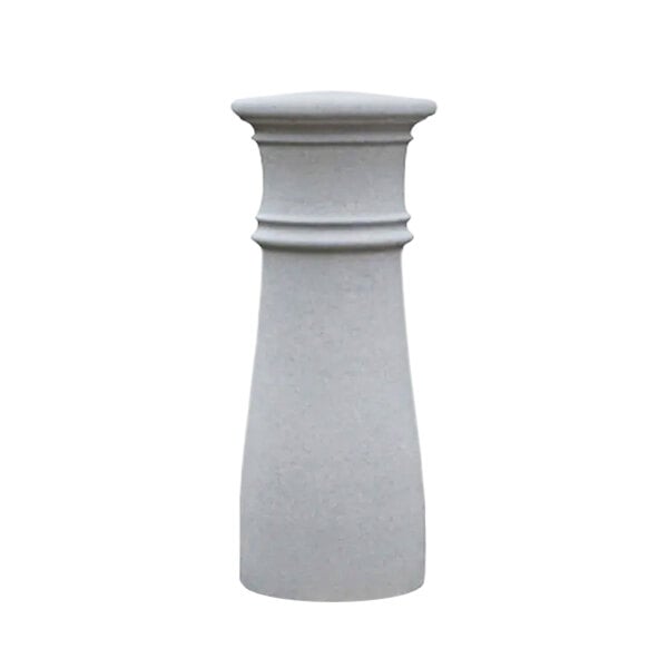 A white cylindrical concrete bollard with a flat top.