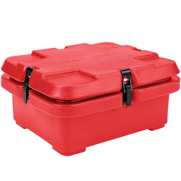 A red plastic Cambro food pan carrier with black straps.