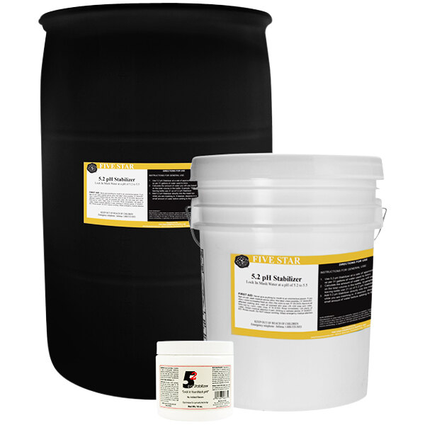 A black barrel with white containers and a yellow label.