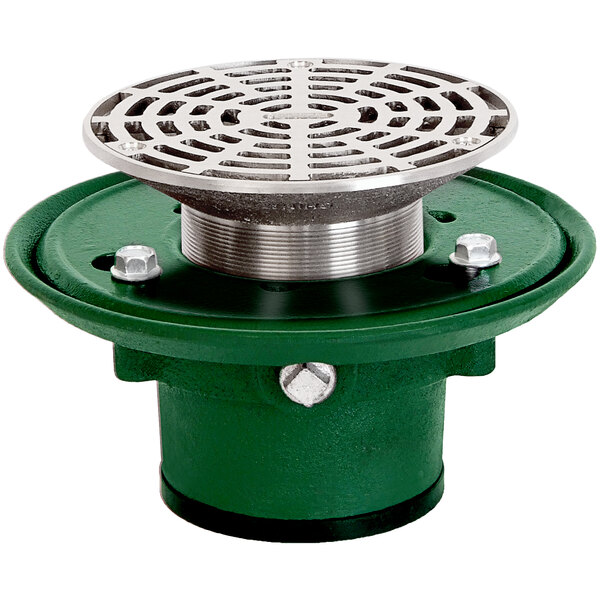 A Josam round metal drain with a green and silver circular design.