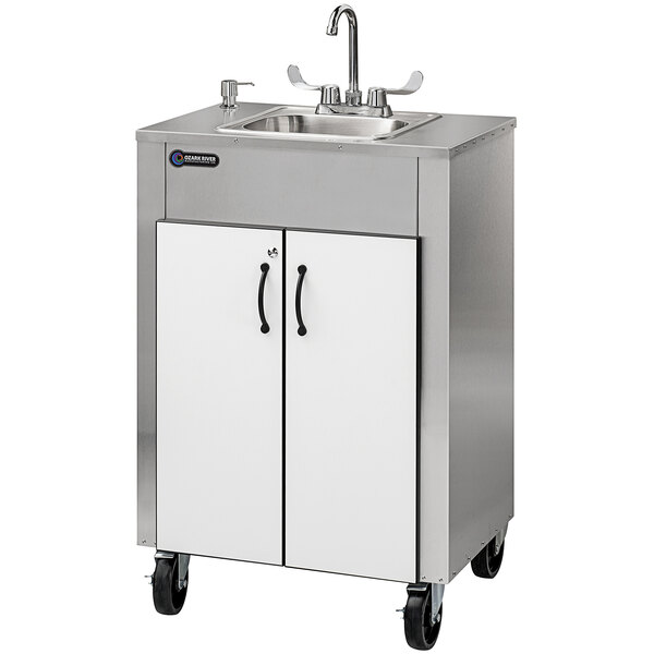 A stainless steel Ozark River portable hand sink with a stainless steel cabinet and a white door.
